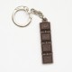 Porte clé vintage publicitaire barre chocolat pup's