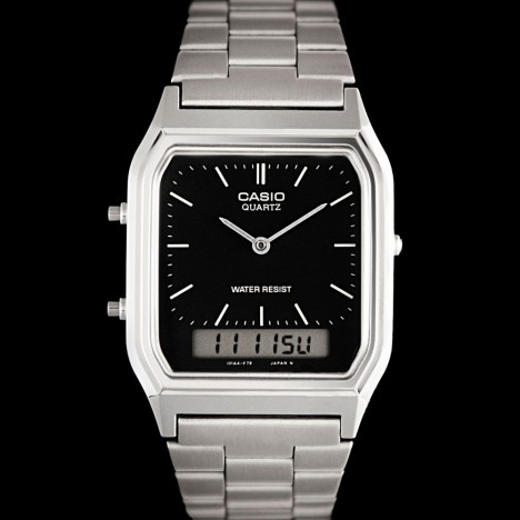 Montre casio vintage argentée aiguilles et digitale, cadran noir