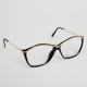 Lunettes vintage Paloma Picasso noires et dorées, verres transparents, modèle d'expo, années 80 - Lunettes vintage femme
