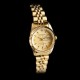 Petite montre Swanson dorée cadran champagne - Femme des années 80